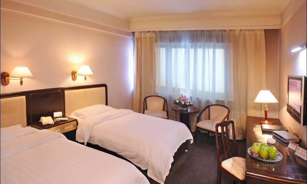 Urumqi Jingu Hotel Экстерьер фото